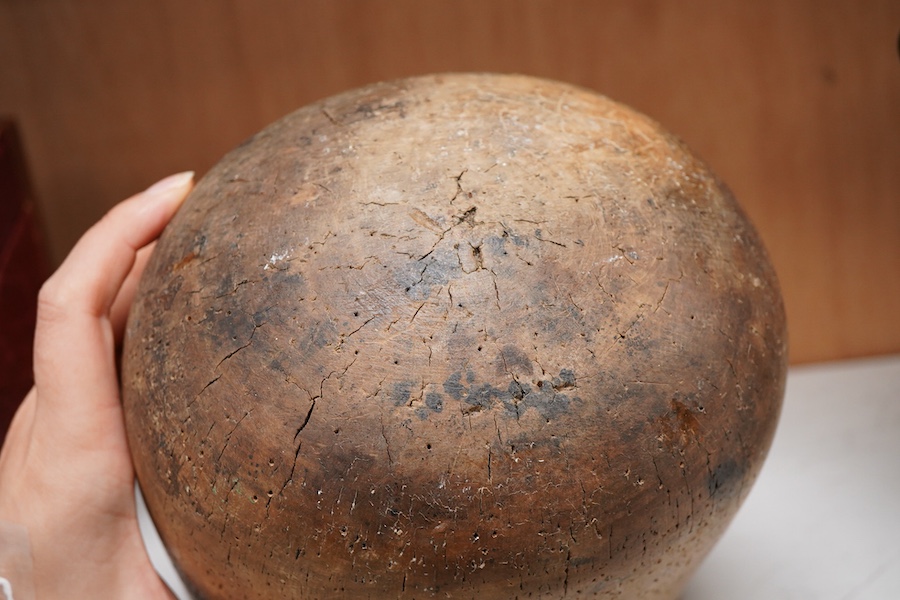 A 19th century milliners hat block stamped Stow & Huggins Ltd, London, 18cm